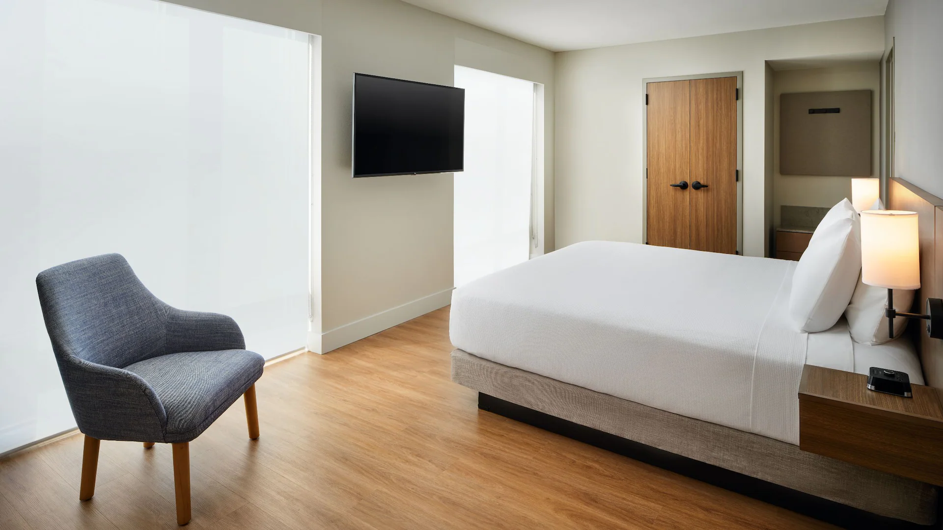 MCOZA-P0020-King-One-Bedroom-Suite-Bedroom.16x9.webp