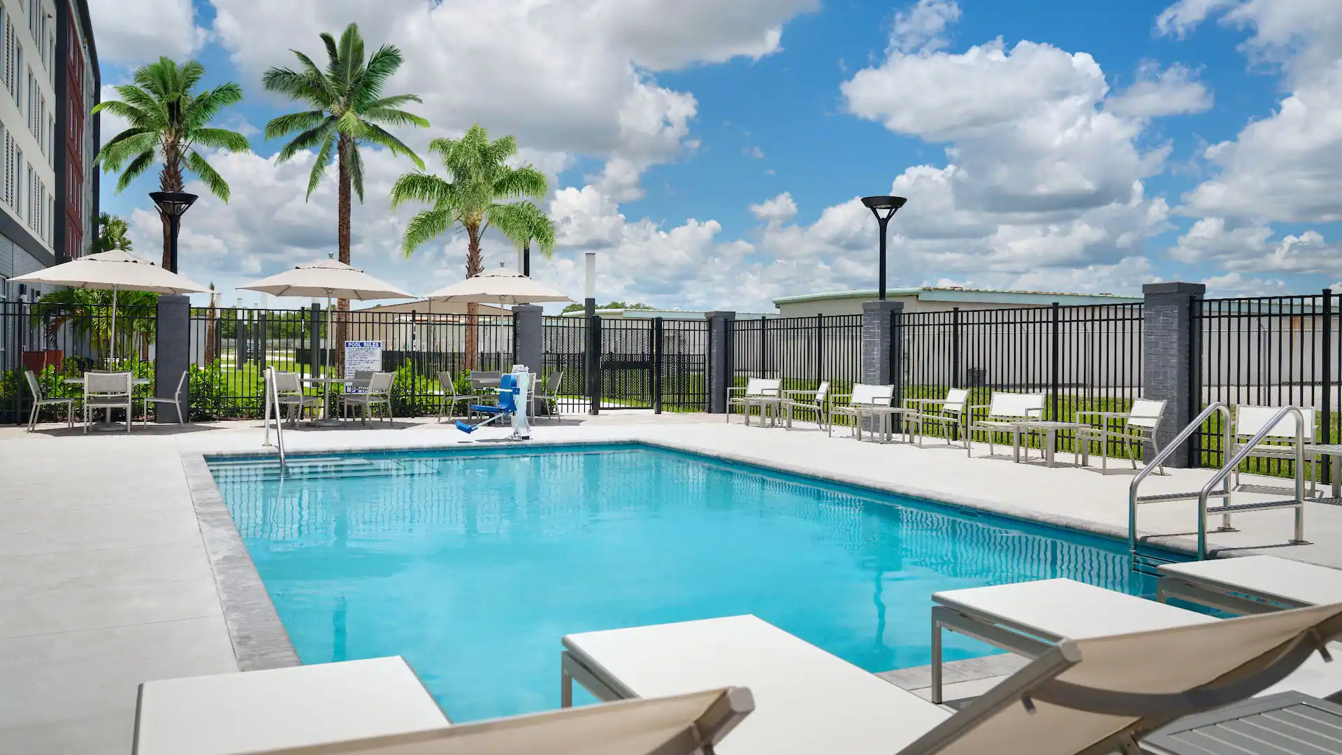 MCOZA-P0039-Outdoor-Pool-Daytime.16x9.webp
